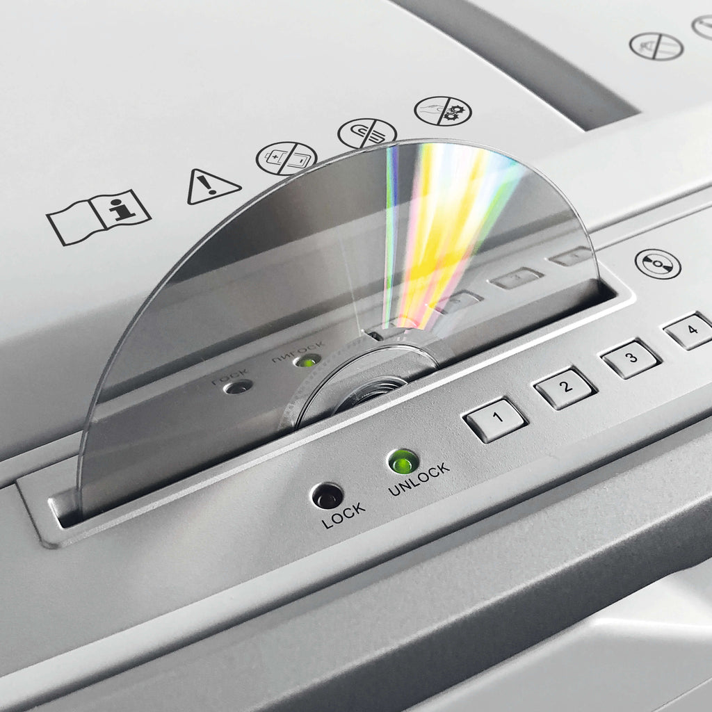 A CD with light reflections is inserted in the separate CD cutter on the top of the Shredcat 8285 document shredder. Two LED lights labeled LOCK and UNLOCK and buttons with the numbers 1-4 are also visible.